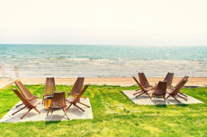 The Long Beach Resort - Beachfront Cottages & Townhouse Suites